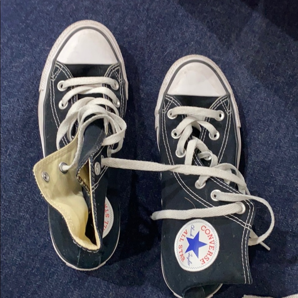 Black and white high top converse